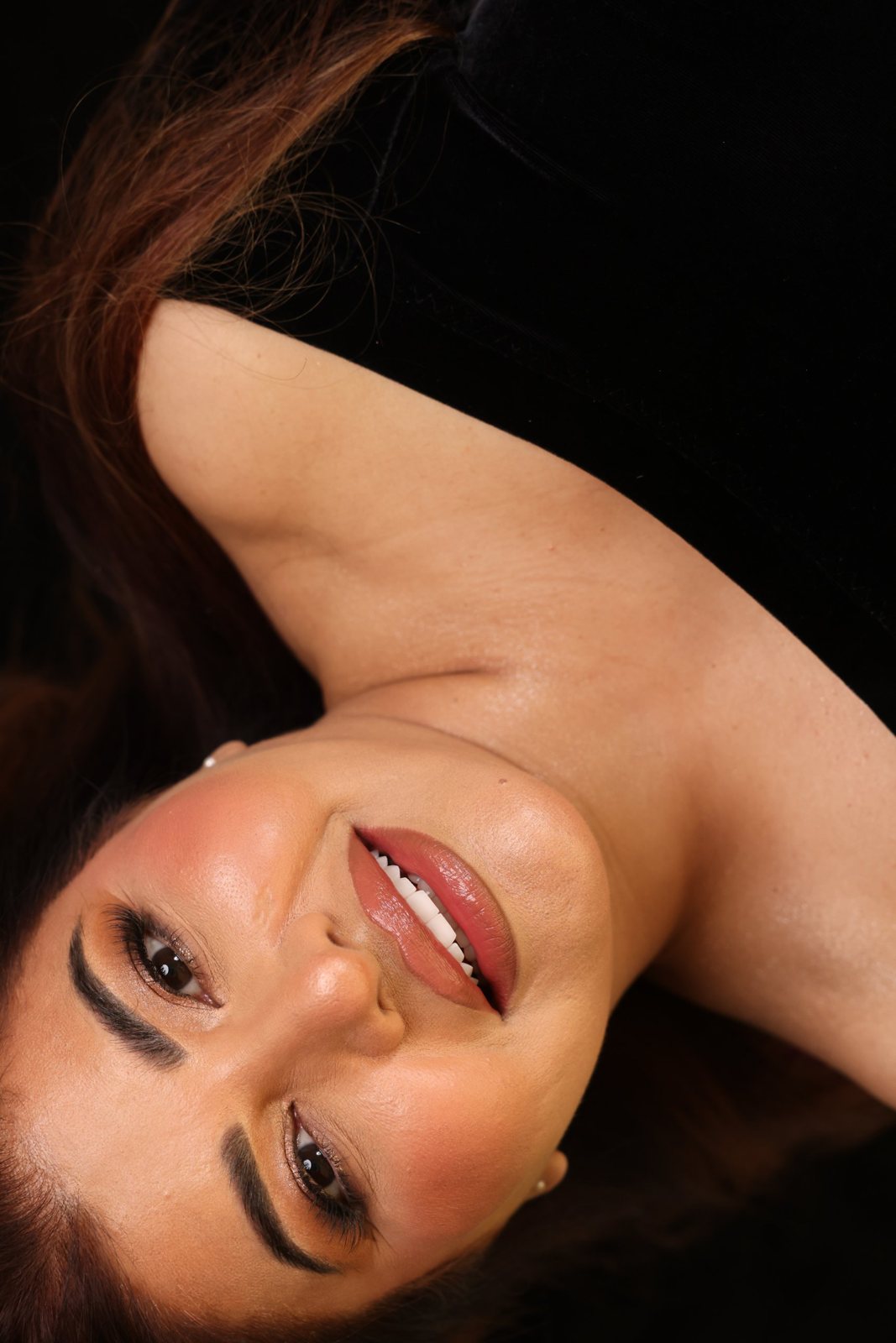 Woman's new smile after a smile makeover in Dubai: studio portrait and close-up of even, bright teeth (3)