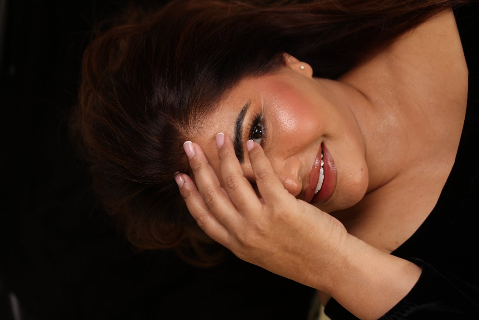 Woman's new smile after a smile makeover in Dubai: studio portrait and close-up of even, bright teeth (4)