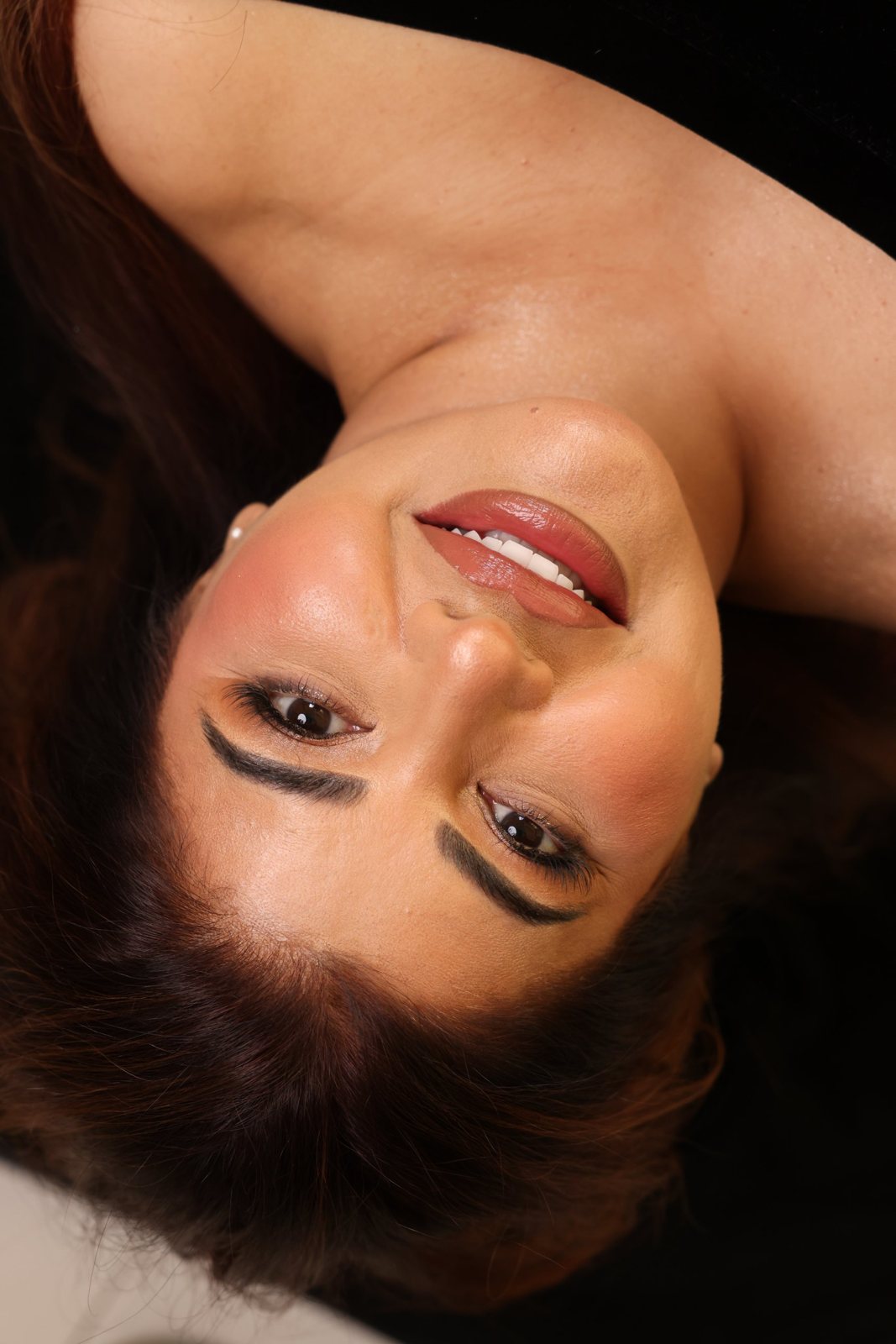Woman's new smile after a smile makeover in Dubai: studio portrait and close-up of even, bright teeth (2)
